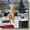 The Baggage Handler (a.k.a. Frank) amongst his suitcases in the Penticton roundabout.